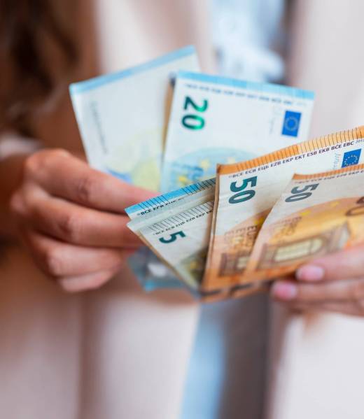 a-girl-holds-banknotes-money-euro-in-her-hands-for-2024-12-05-18-18-17-utc